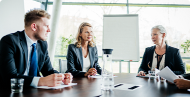 Picto of three people in a meeting room