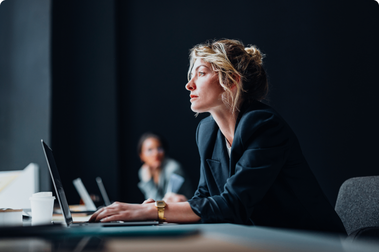Photo of a person at their computer searching for advice on business cybersecurity