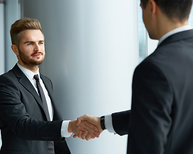 Two entrepreneurs shaking hands