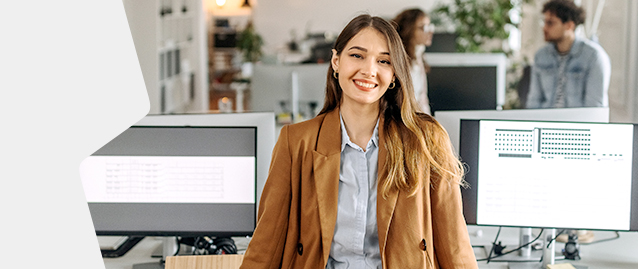 Photo of a person smiling in an office