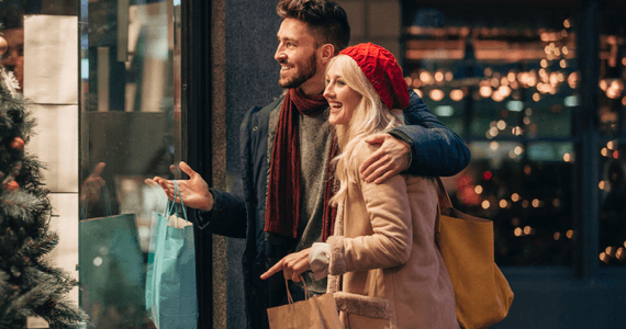 A smiling couple shopping