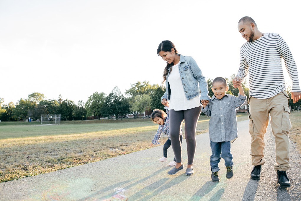 family-walking-in-a-park