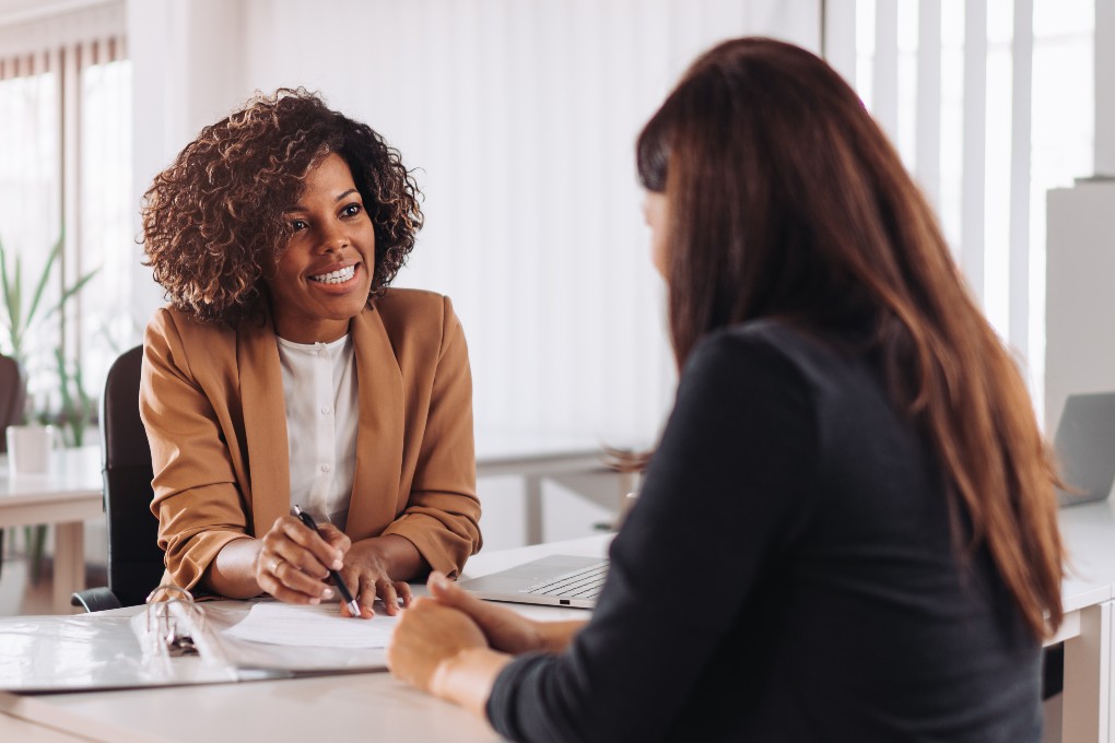 Image of financial advisor and client discussing LIRA