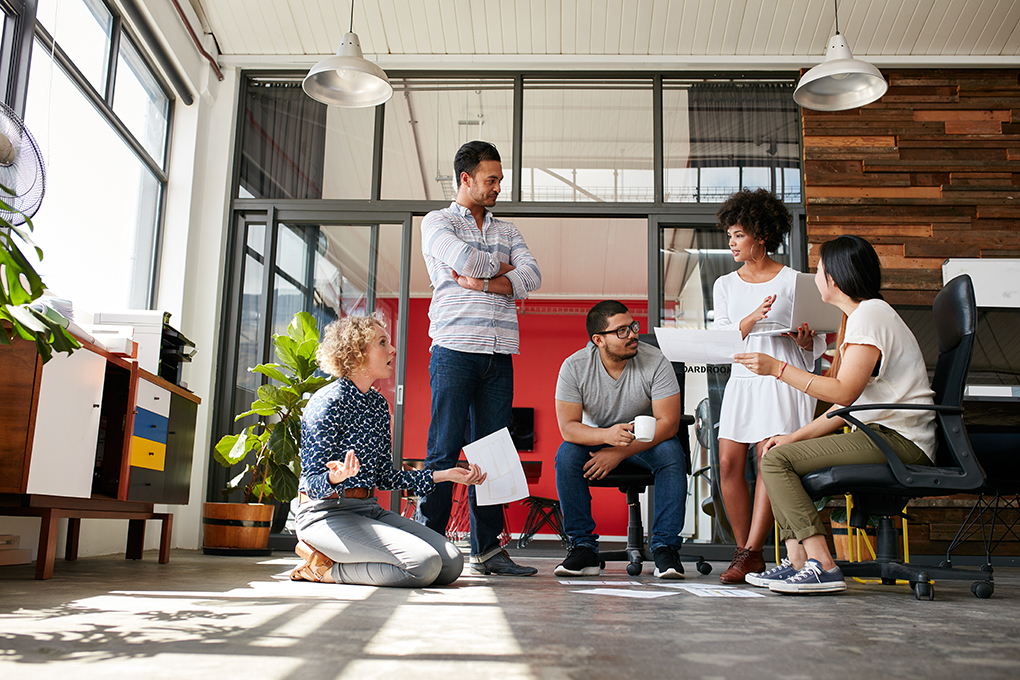 A work team prepares a business plan for their company to go international.  