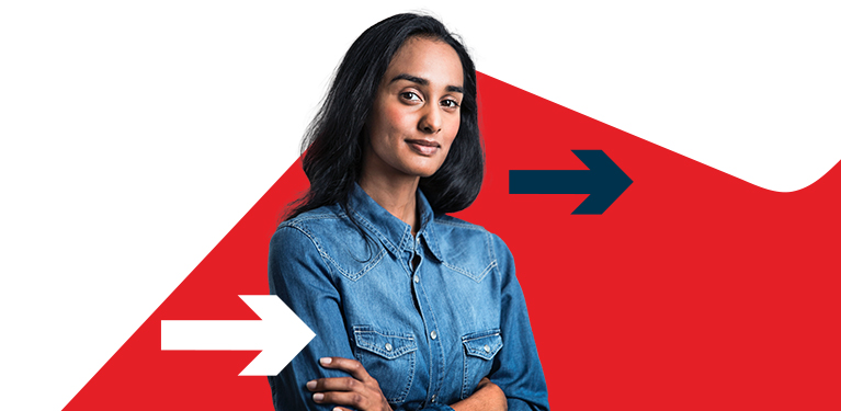 Photo of someone who has immigrated to Canada in front of the National Bank logo 