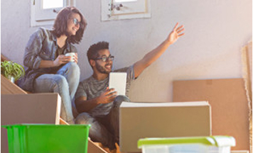 Photo of two young people in an apartment