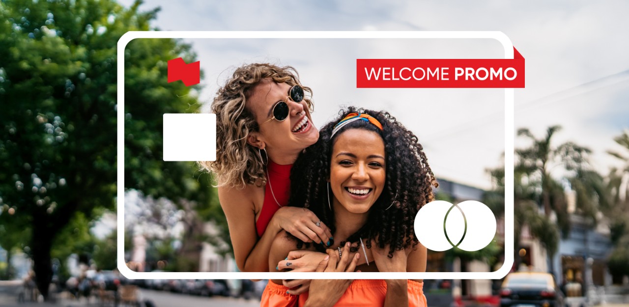 Photo of two people smiling while enjoying the Platinum Mastercard credit card welcome promo 