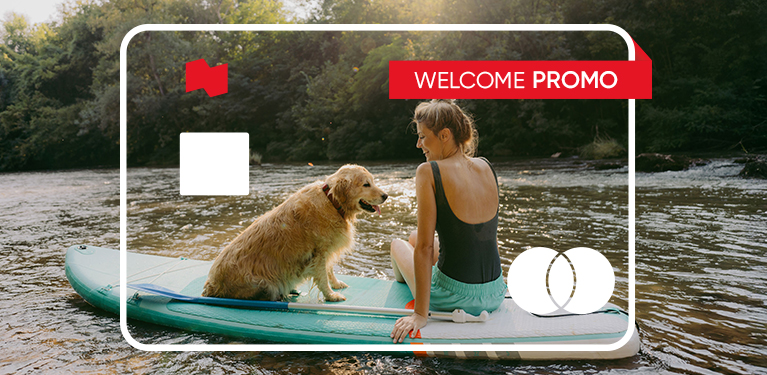 Photo of a person and a dog enjoying an activity thanks to their World Elite Mastercard credit card 