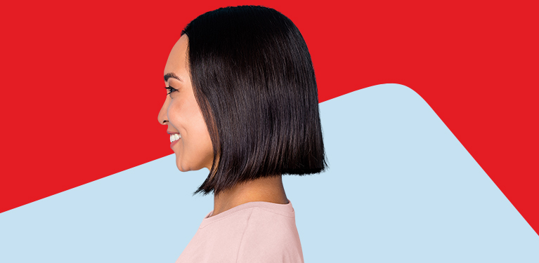 Photo of a person’s side profile with the National Bank logo in the background